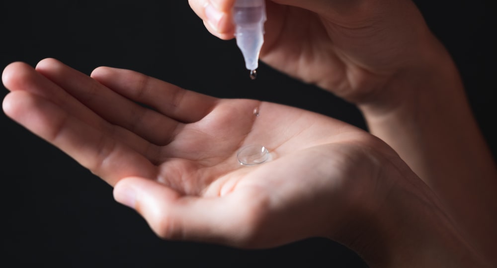 Contact Lenses Placed On Hand For Cleaning