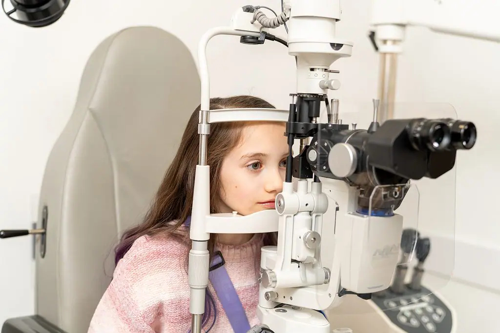 childs eye exam with our expert team member